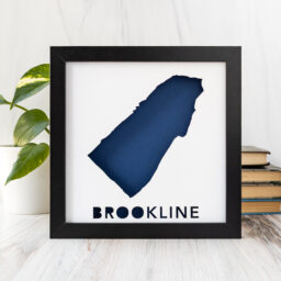 a framed blue map of Brookline, MA with the word Brookline on it
