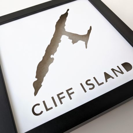 a framed poster with the word cliff island on it