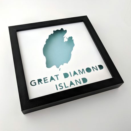 Framed map of Great Diamond Island, Maine at an angle with a light blue background