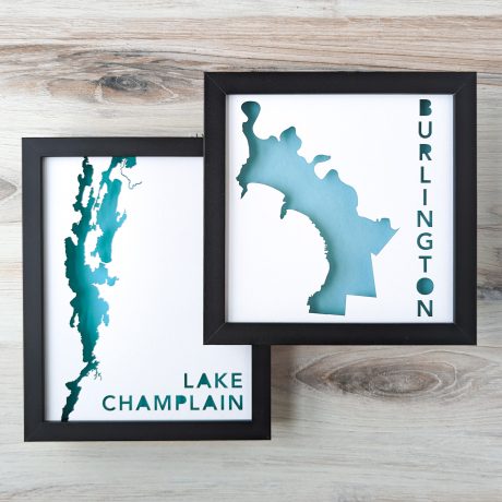 two framed maps, one of burlington, vermont, and one of lake champlain