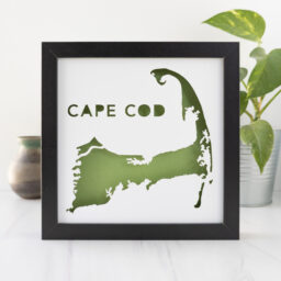 a black frame with a green map of Cape Cod, Massachusetts