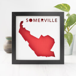 a picture frame with the shape of a map of Somerville, MA