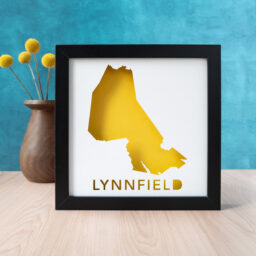 a black frame with a yellow map of the town of lynnfield, MA