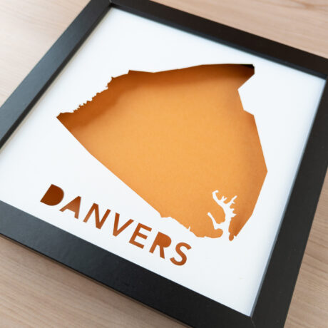 a framed map with the word Danvers at the bottom