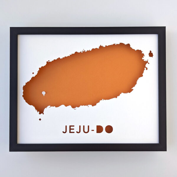 a framed map of the island of Jeju in South Korea, labeled "Jeju-do"